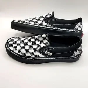 Vans Skate Shoe - Black White Canvas Doodle Checkerboard Slip ons Vans Slip-On Checkerboard Skate Shoe - Black / White | Journeys main image 2